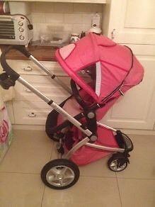 Pink stroller with car seat