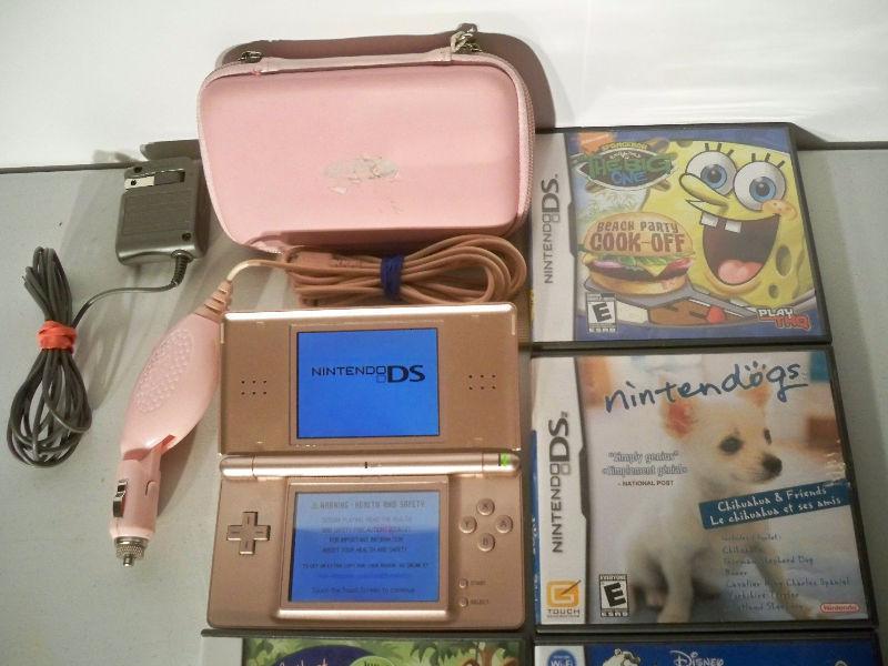 Pink Nintendo DS with ten games two chargers etc