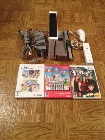 Nintendo Wii with 5 games