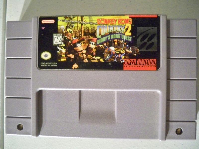 Super Nintendo with Donkey Kong Country 2 and one controller etc