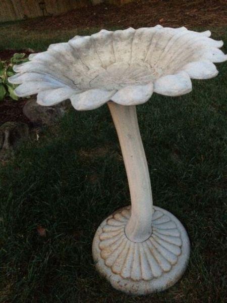 Lovely outdoor bird bath with pretty floral motif basin