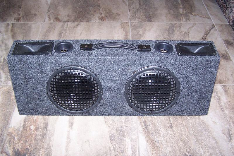 CAR DUAL SUBWOOFERS IN GRAY CARPET PORTED BOX