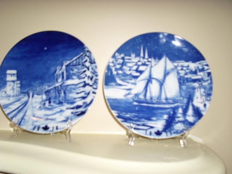 Blue Christmas Plates with stands, boxes and paperwork