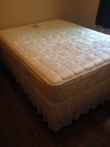 Queen size Sealy Posturepedic mattress and box spring