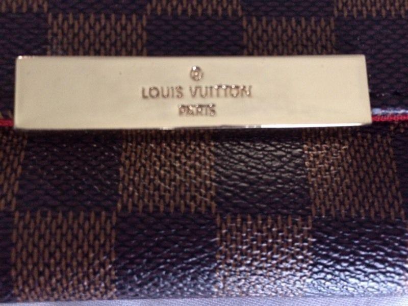 Louis Vuitton Clutch MM