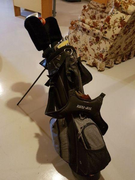 Spalding golf clubs and bag
