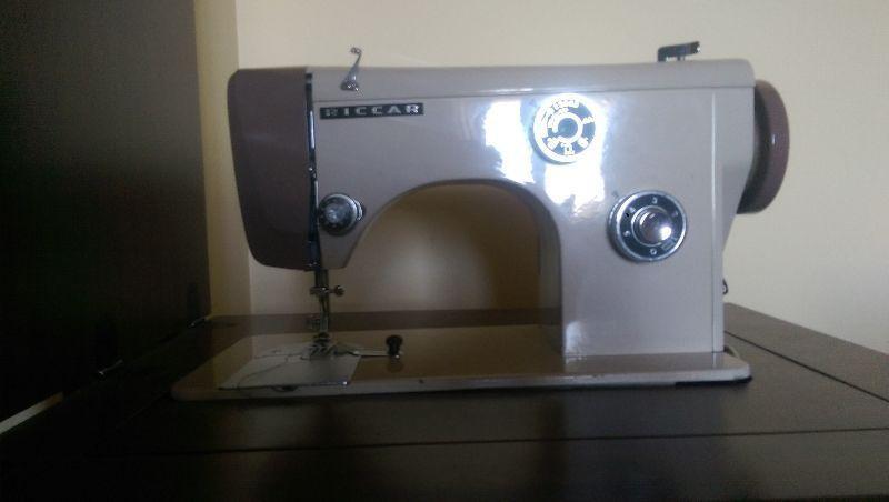 A vintage electric sewing machine in working order