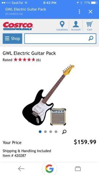 Electric guitar in box with amp