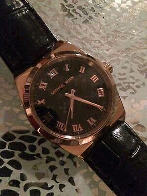 Barely worn Michael Kors Rose Gold Watch with box. Worth over $