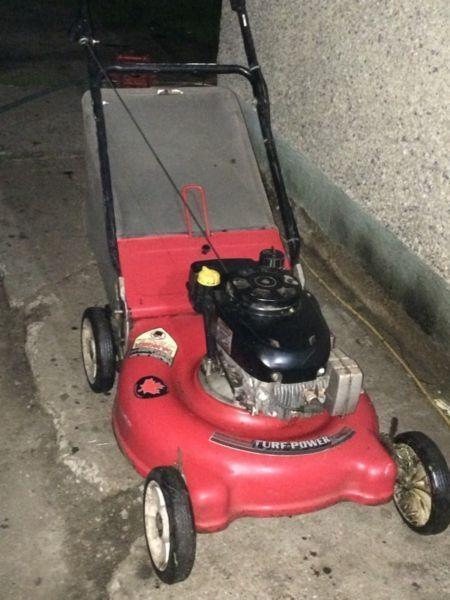 Lawnmower with rear bag