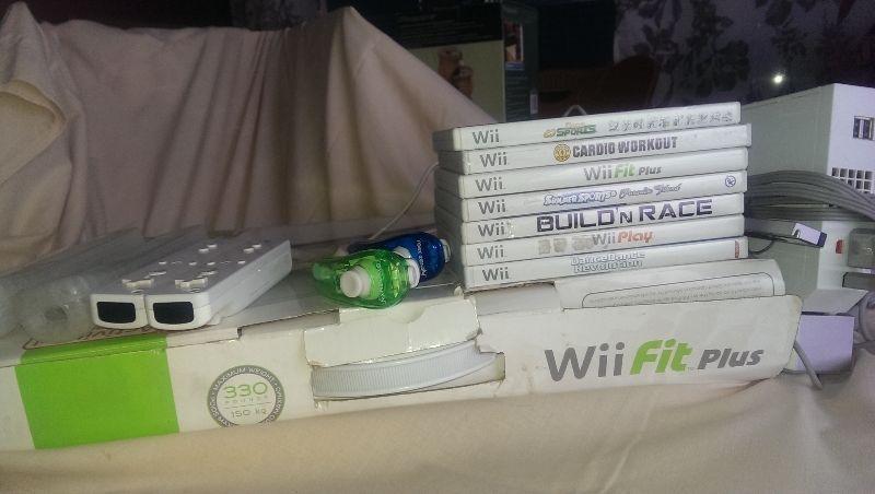 The Whole Wii Kit and kaboodle with 7 games