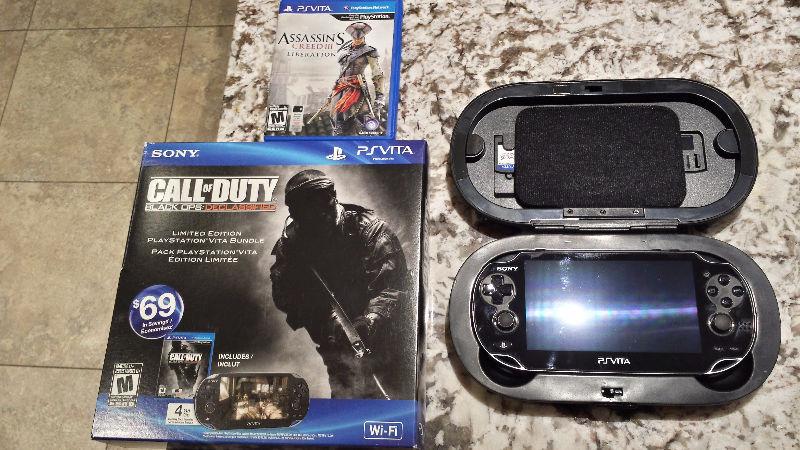PS Vita w/ hard case and 2 games