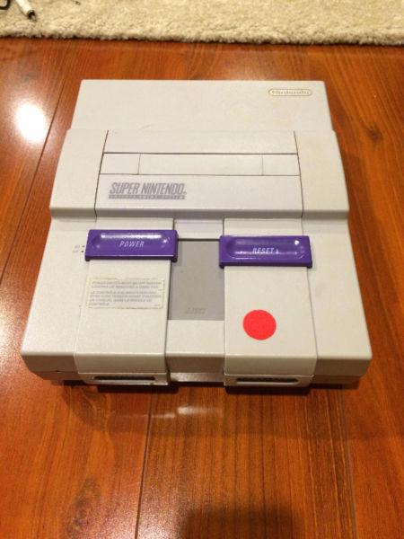 SNES w/ all hookups, 3 controllers, and 2 games