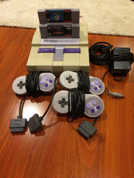 SNES w/ all hookups, 3 controllers, and 2 games