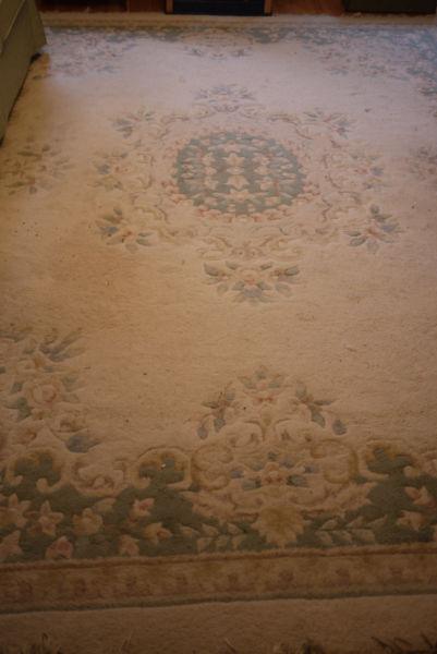 hand Knotted wool carpet , made in India. 104 x140 inches