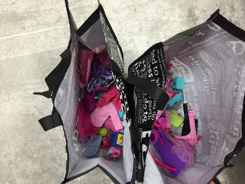 $500 worth of Barbie dolls - clothes - accessories