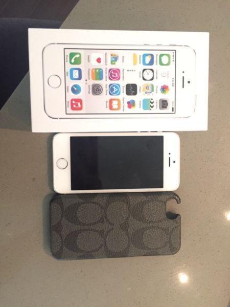 Silver iPhone 5s locked to Rogers obo