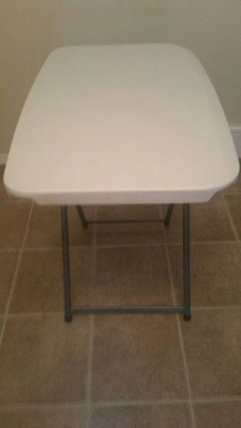 Medium size folding table. Great for summer barbecues