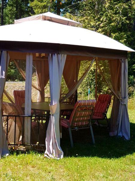 Gazebo octagon patio table and 6 padded chairs
