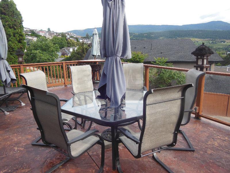 Glass Patio Table and 6 Chairs