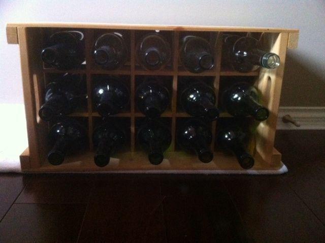 4 wooden wine crates filled with empty clean wine bottles