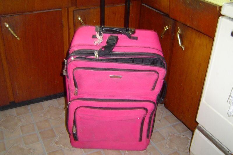 PINK COLORED LUGGAGE