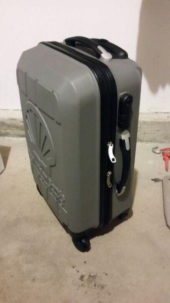 Suitcase - on wheels ...NEW ...have 3