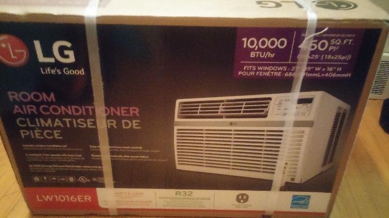 10000 btu lg. Window air conditioner new in box