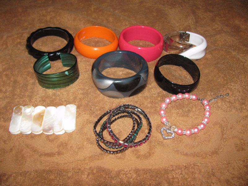 Huge lot of funky Plastic bracelets. They're back in style!