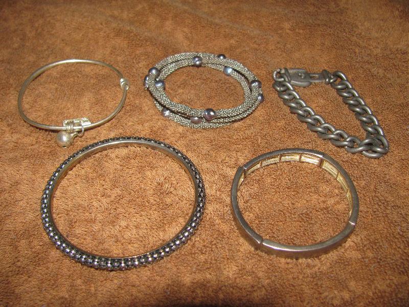 Huge lot of silver and beaded bracelets