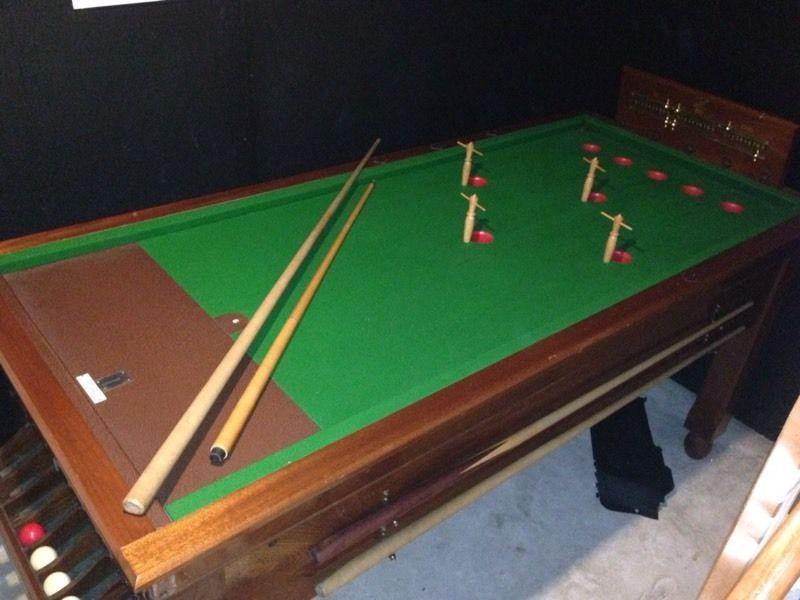 Traditional English Bad Billiards table with cues