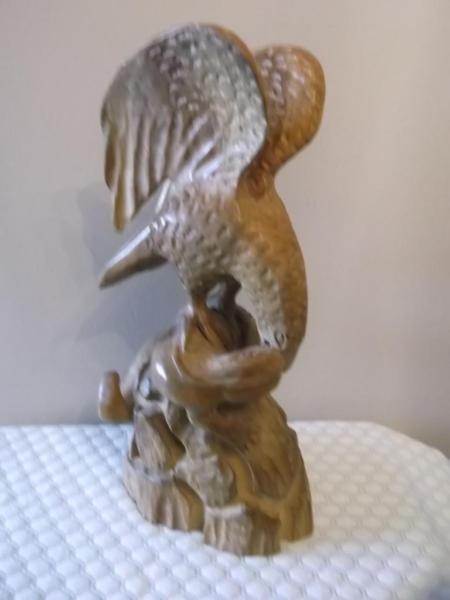 Large solid wood hand carved Eagle killing a crocodile
