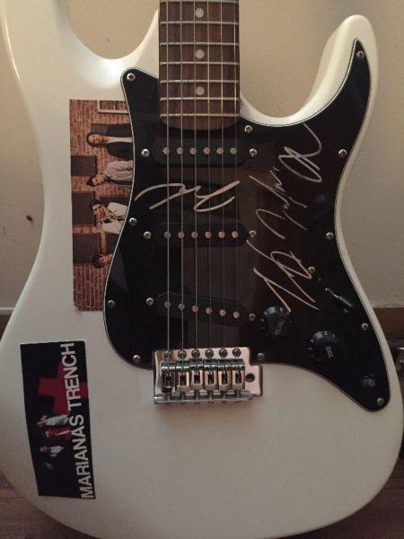 Authentic autographed by Marianna's Trench electric guitar