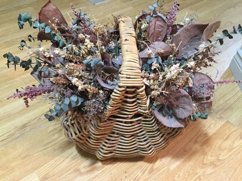 Two dried flower arrangements