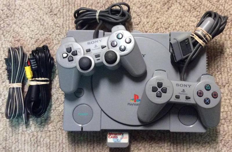 Playstation 1 with 2 Controllers and 8 Games!!