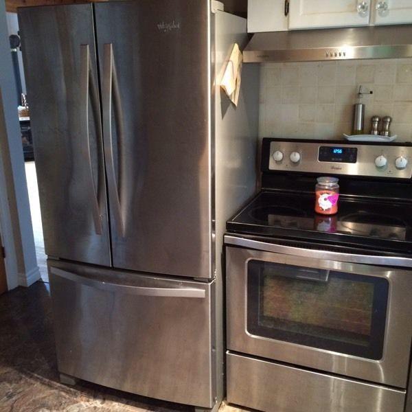 Stainless steel whirlpool fridge and stove