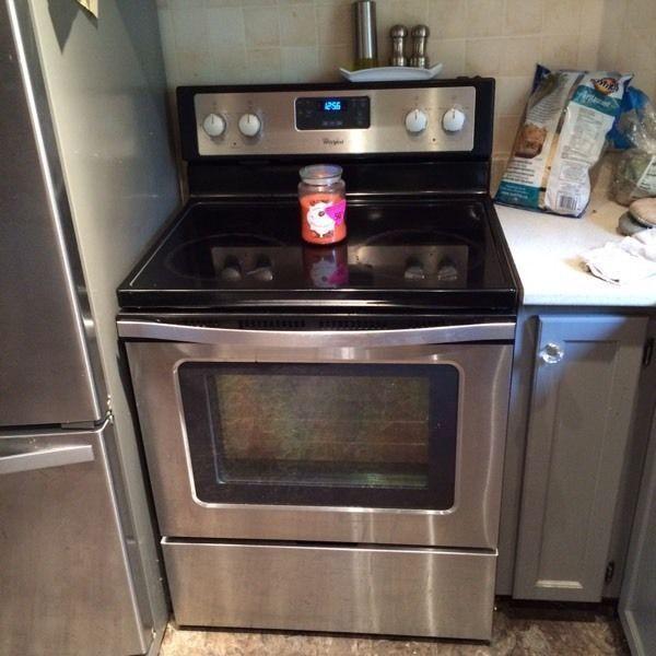 Stainless steel whirlpool fridge and stove