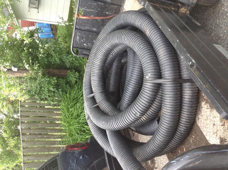 2 large rolls pererated pipe