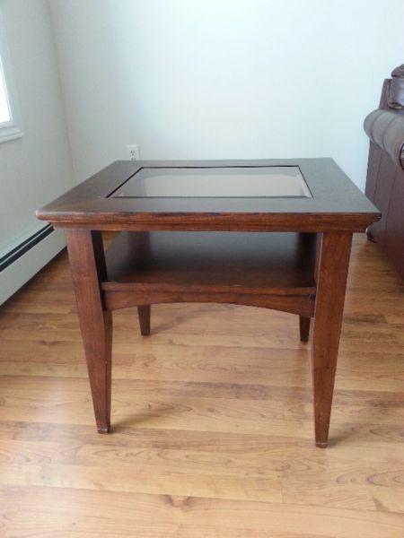 Selling: dark wood coffee table with a glass center