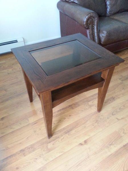 Selling: dark wood coffee table with a glass center