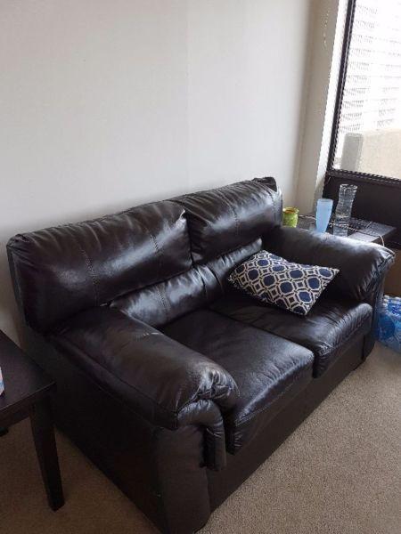 Dark brown love seat and chair set