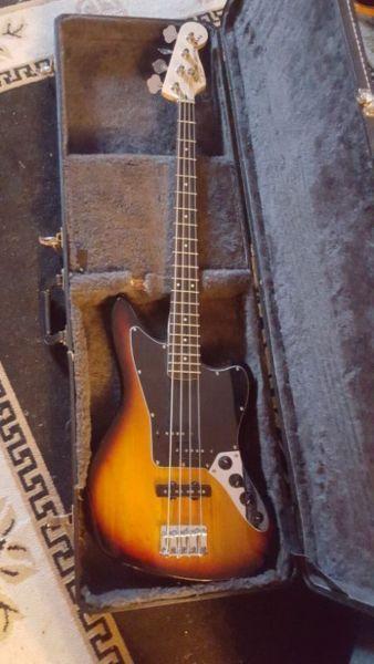 Squire by Fender jaguar bass guitar and case