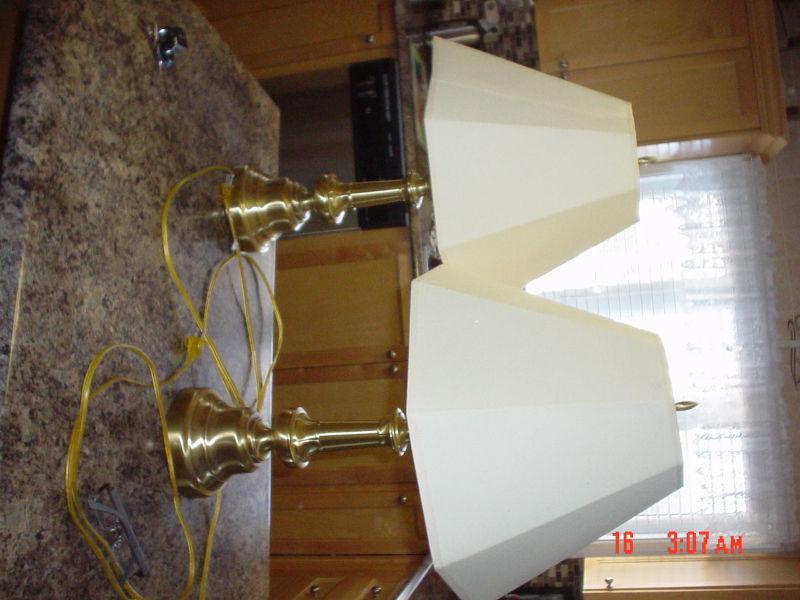 @ beautful table lamps, gold base make anything $60.00 ono
