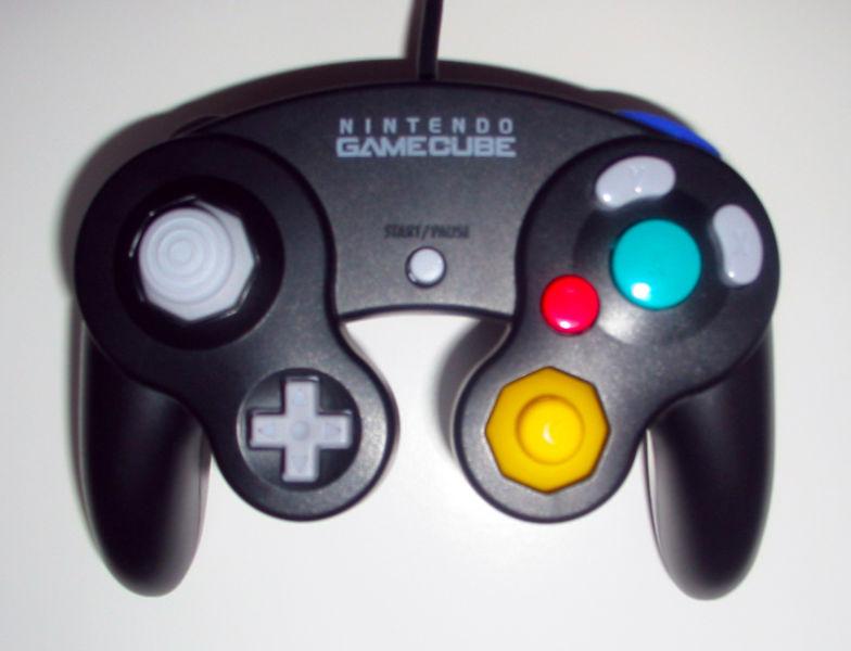 Two Mint Condition Original Black Gamecube Controllers