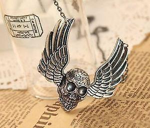 skull wing necklaceand wolf tooth 1 black and 1 blue 2 cross new