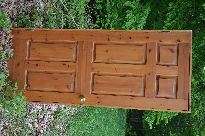2 solid core pine doors with casings and hardware