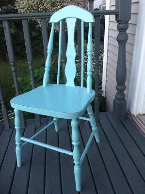 Antique wooden chairs painted in summer colors