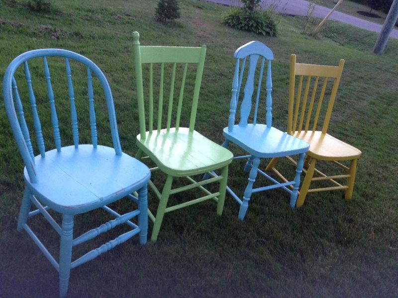 Antique wooden chairs painted in summer colors