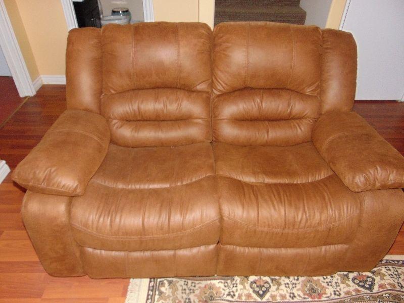 Recliner love seat for sale, never used