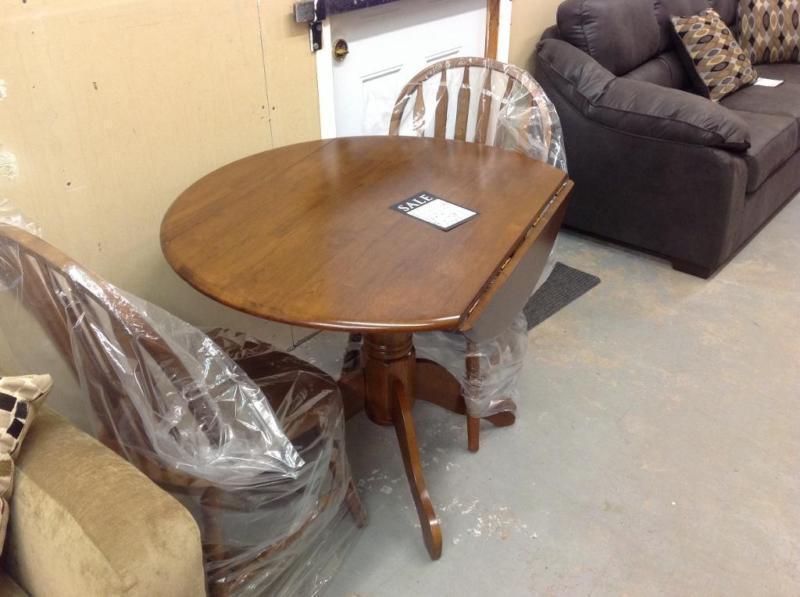 Brand new 3 piece dining set with side leaf...taxes in!
